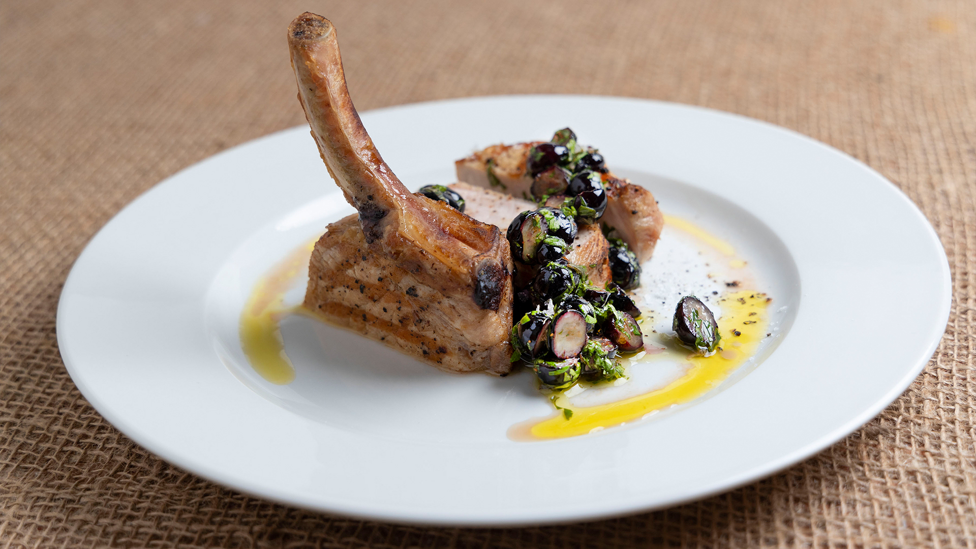 Pork chop with blueberry chimichurri