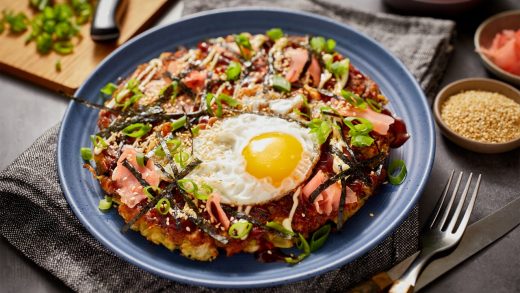 Okonomiyaki with crispy fried eggs