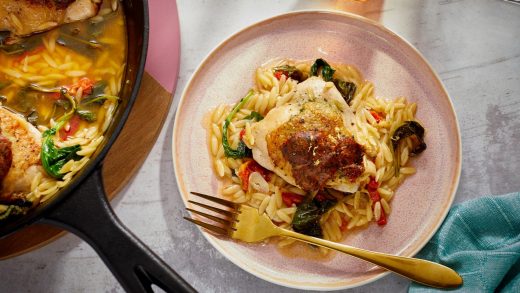 Garlicky breadcrumb chicken thighs with orzo and greens