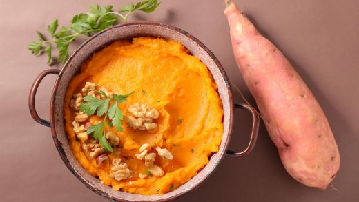 Sweet potato mash with pumpkin seed topping