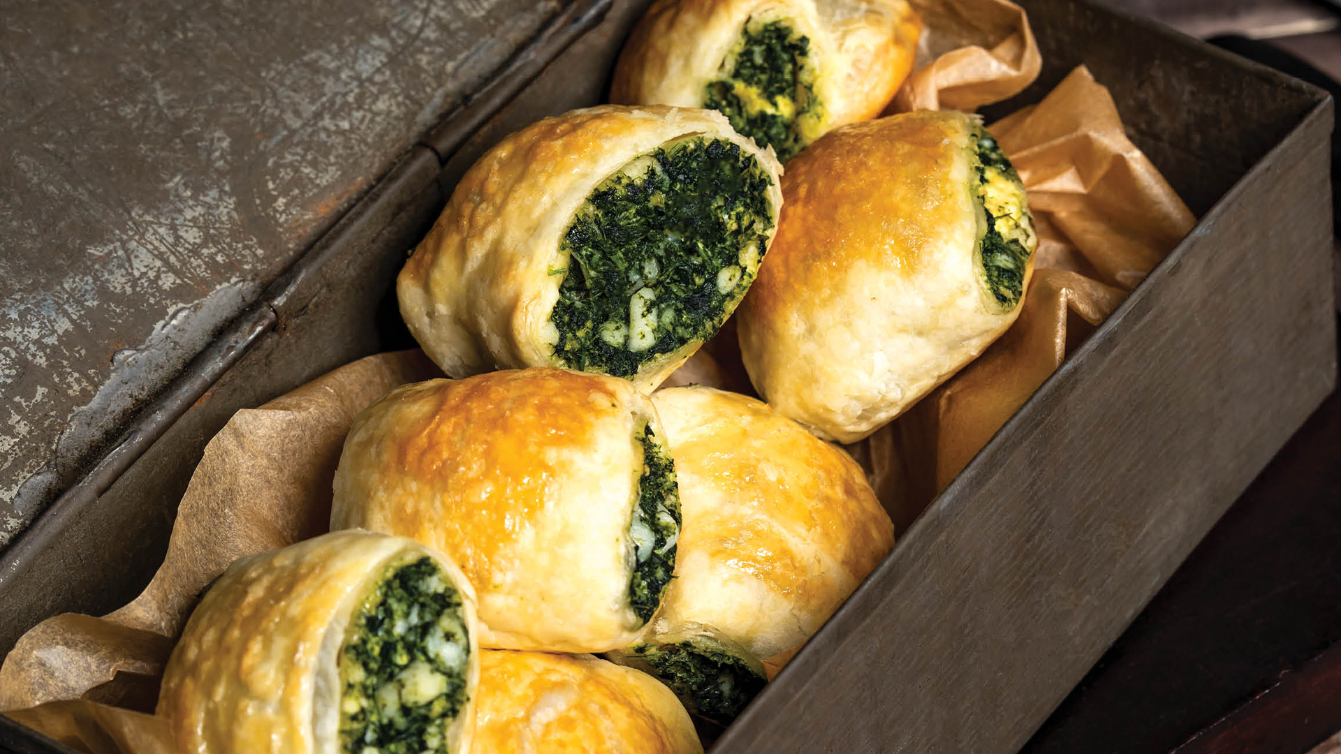 Puffed and stuffed  spinach pastries