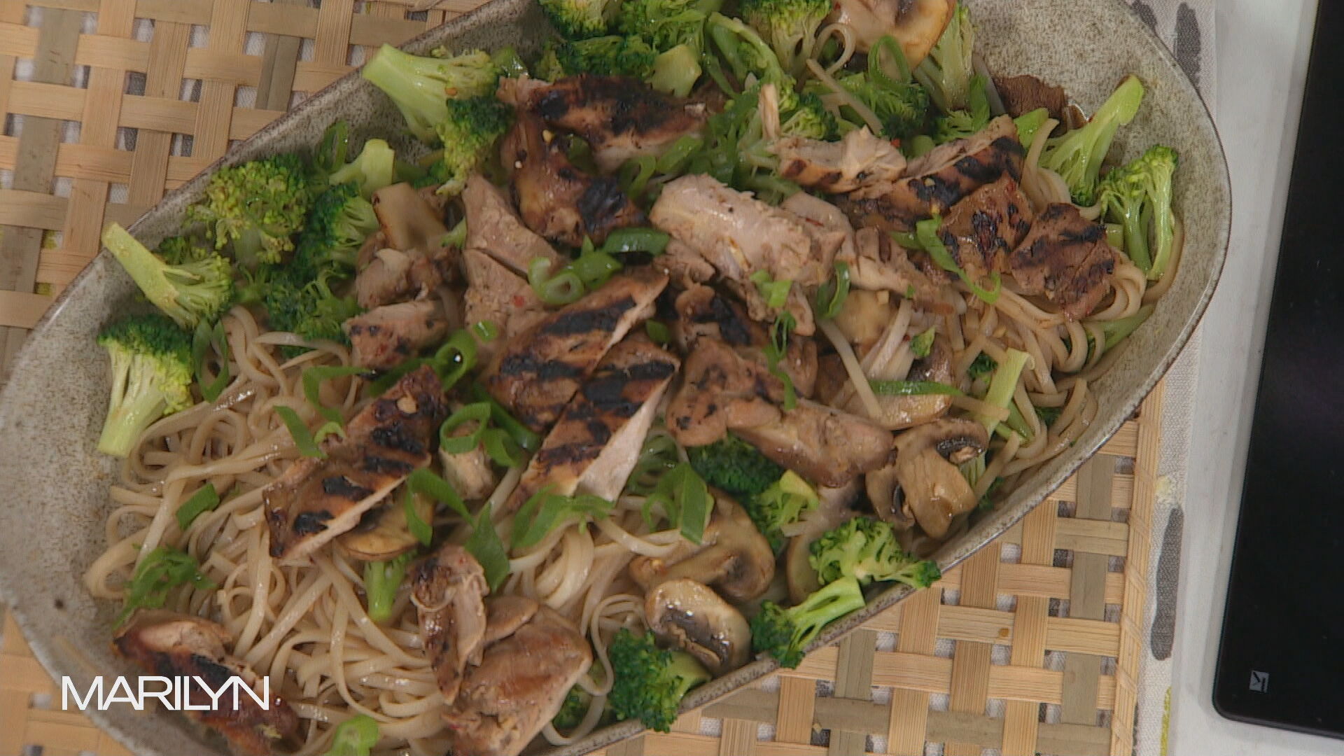 Mushroom and broccoli stir fry with chicken and rice noodles