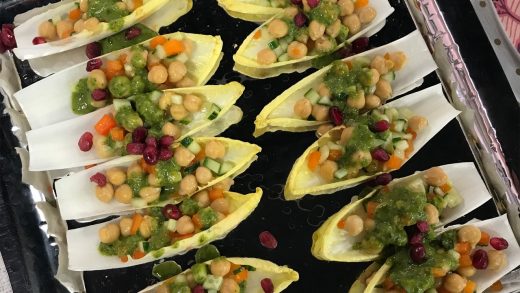 Chickpea salad in endive spears with green goddess dressing