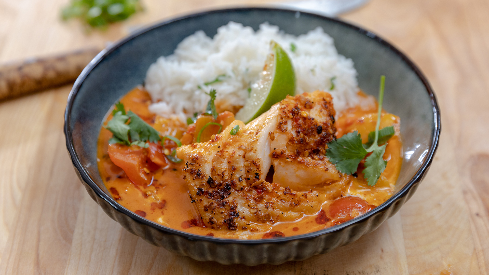 Halibut and shrimp moqueca with spicy coconut broth and garlic scented rice