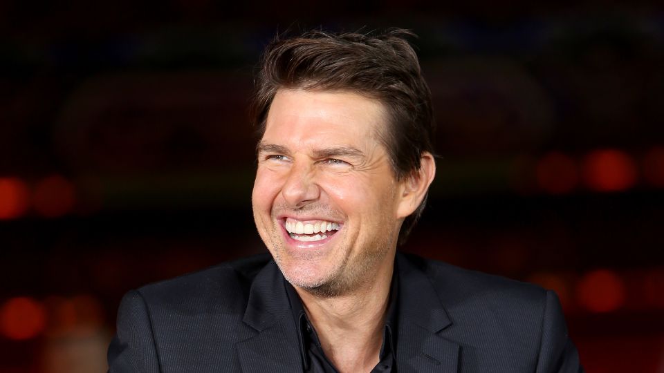 A masked Tom Cruise heads out to the movies