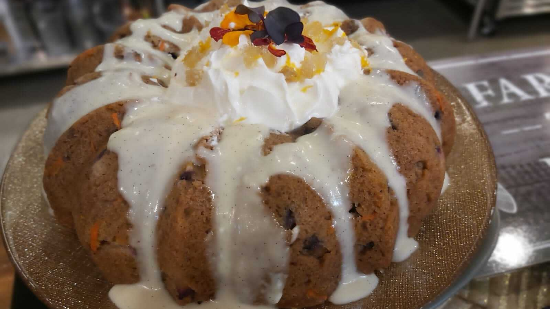 Steamed plum pudding with vanilla bean rum sauce