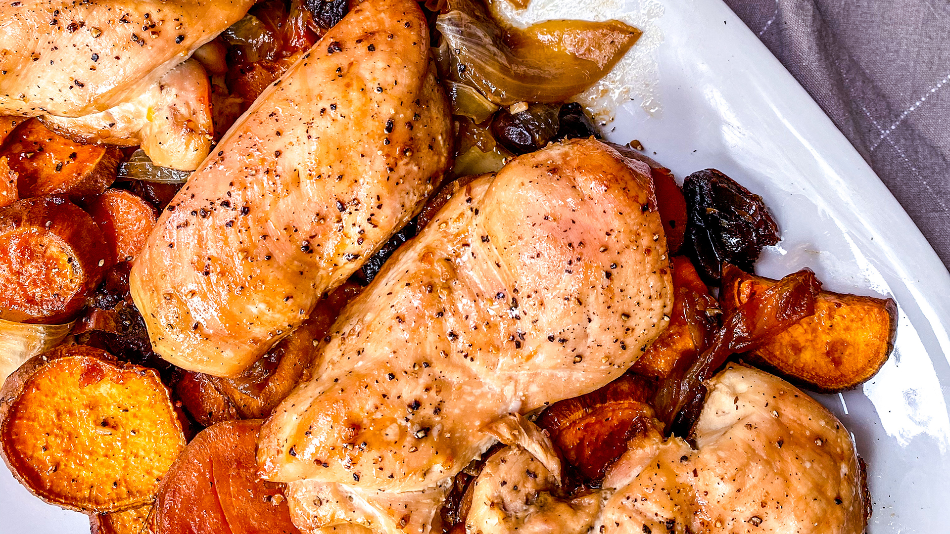 Roasted honey chicken breasts with roasted sweet potatoes and dates