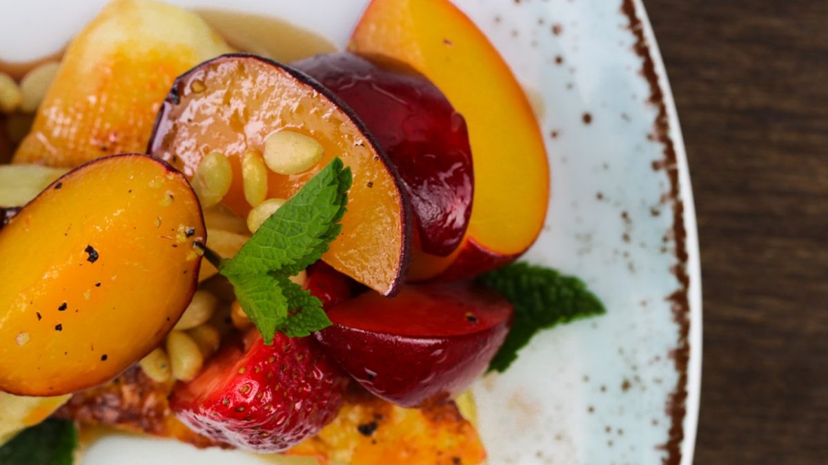 Seared halloumi with glazed fruit