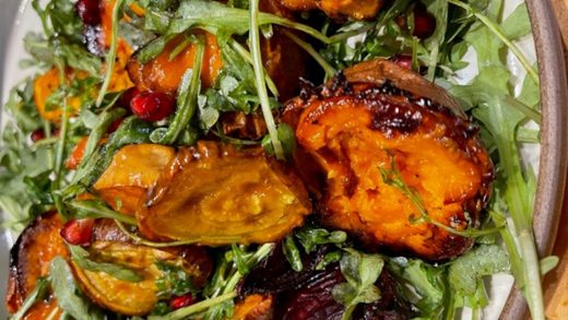 Roasted root vegetables salad with pomegranate maple dressing