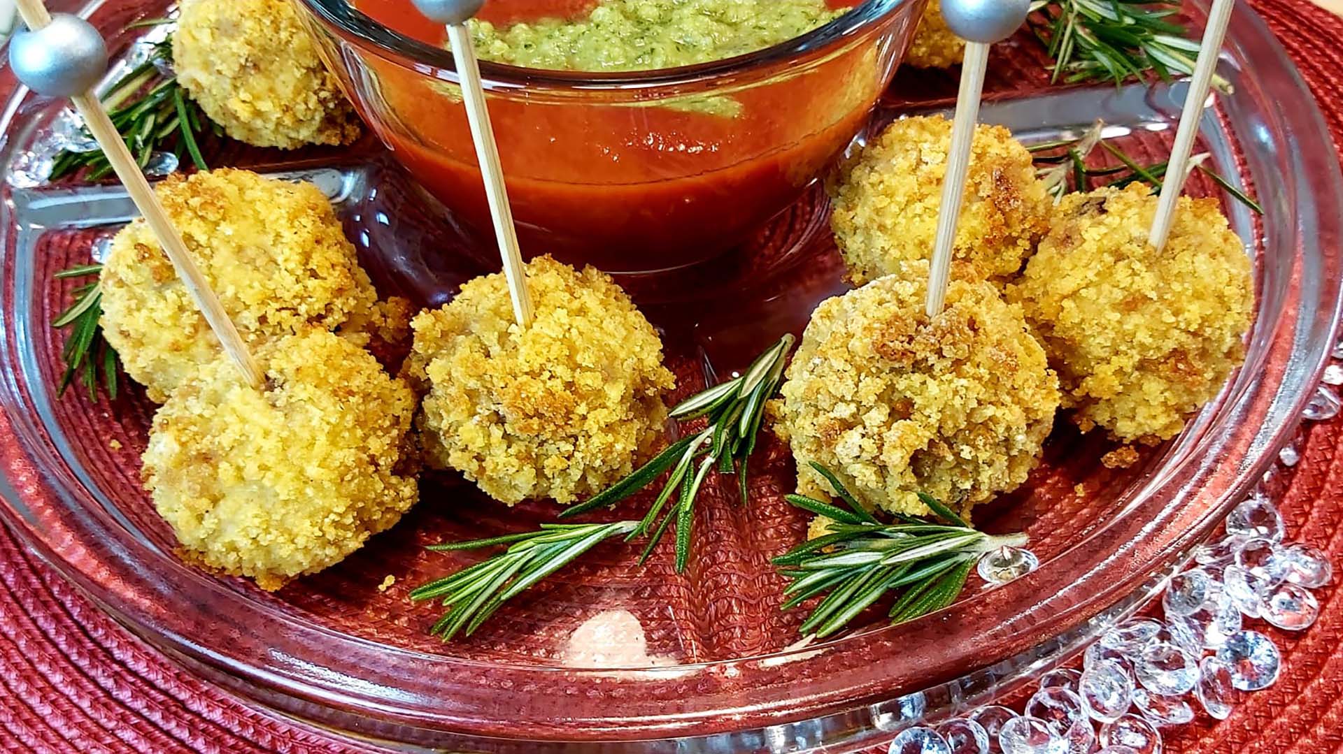 Veal-stuffed cornbread fritters in holiday cocktail sauce