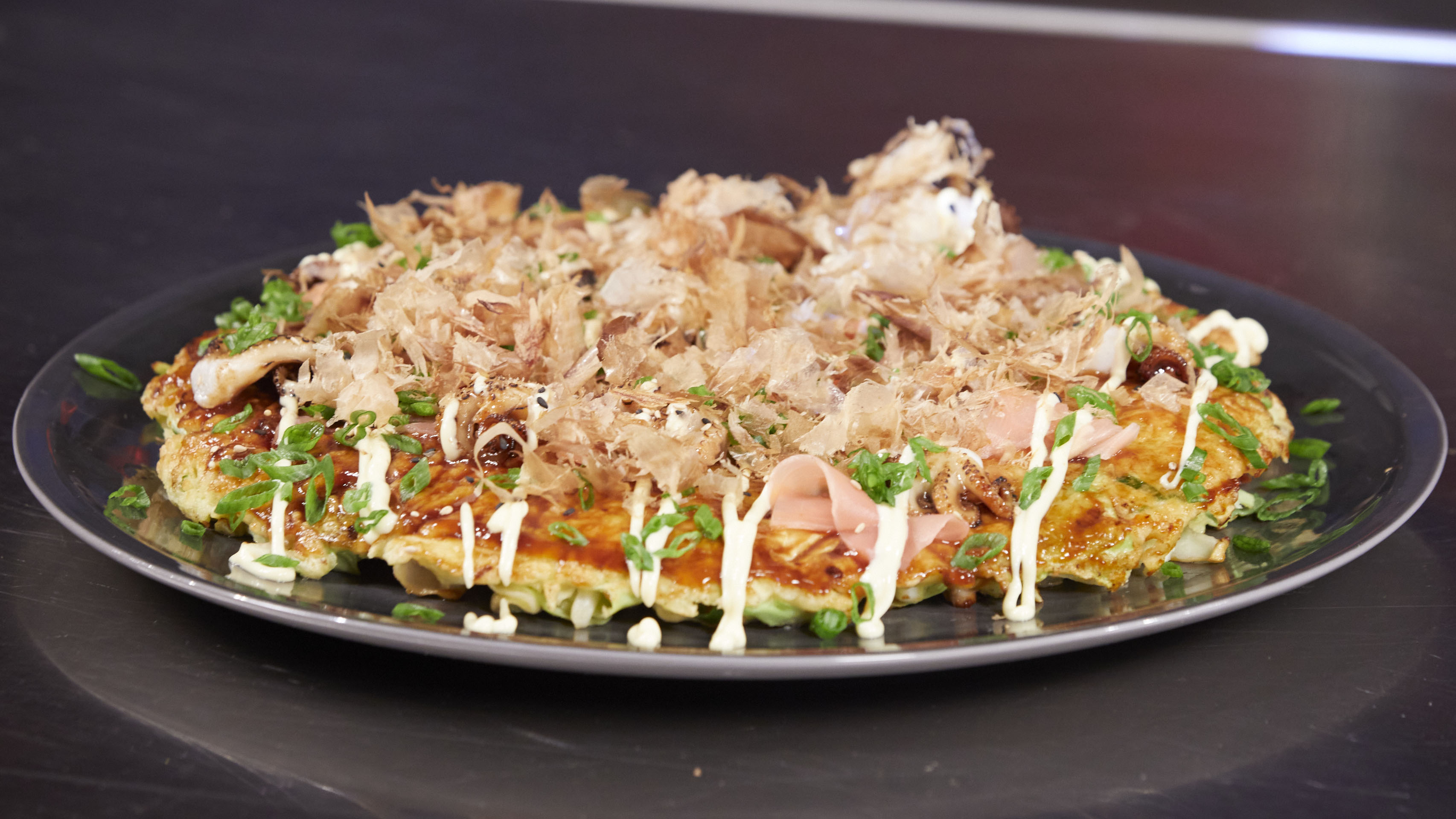Okonomiyaki with dashi and marinated grilled octopus