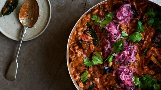 Aubergine and peanut stew with pink onions