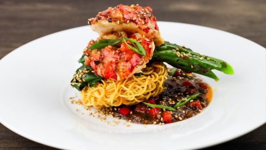 Cantonese chow mein with gai lan and lobster tail