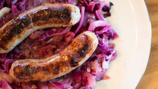 Braised sausage with cabbage and apples