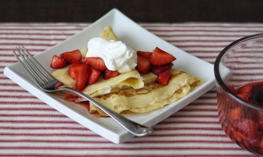 European-style pancakes with macerated strawberries