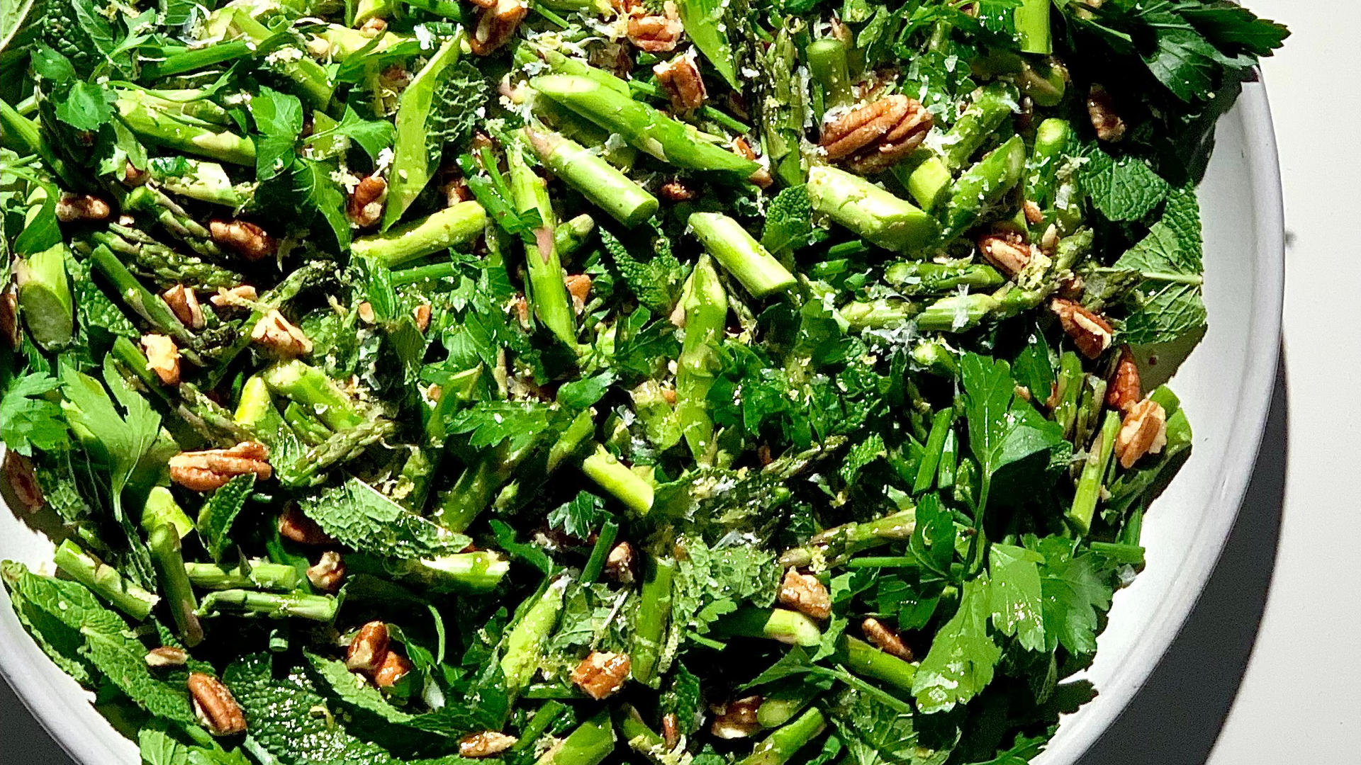 Raw asparagus, fresh herb and citrus salad