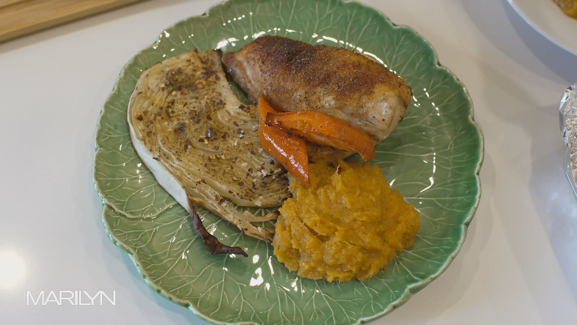 Stuffed roast chicken with red potato mash and maple glazed carrots
