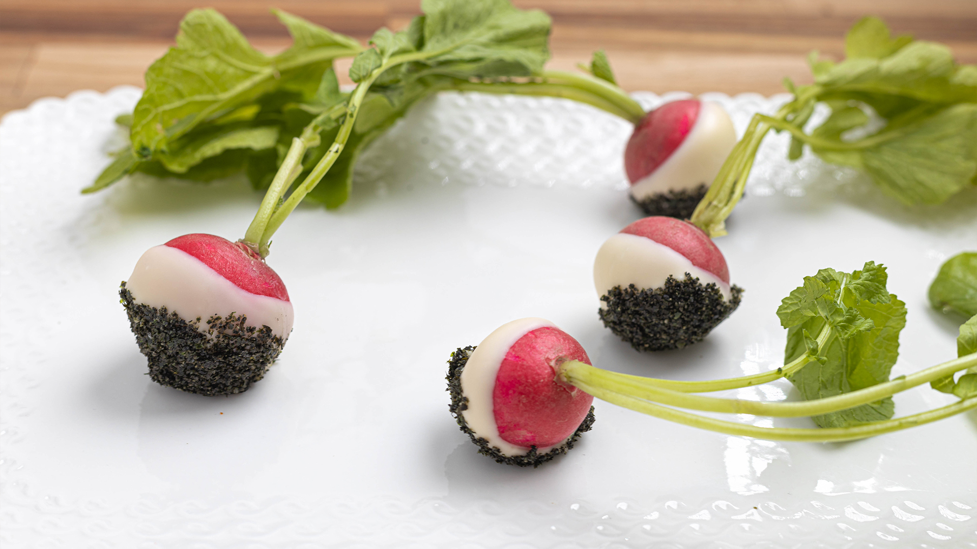 Butter dipped radish with sesame and nori