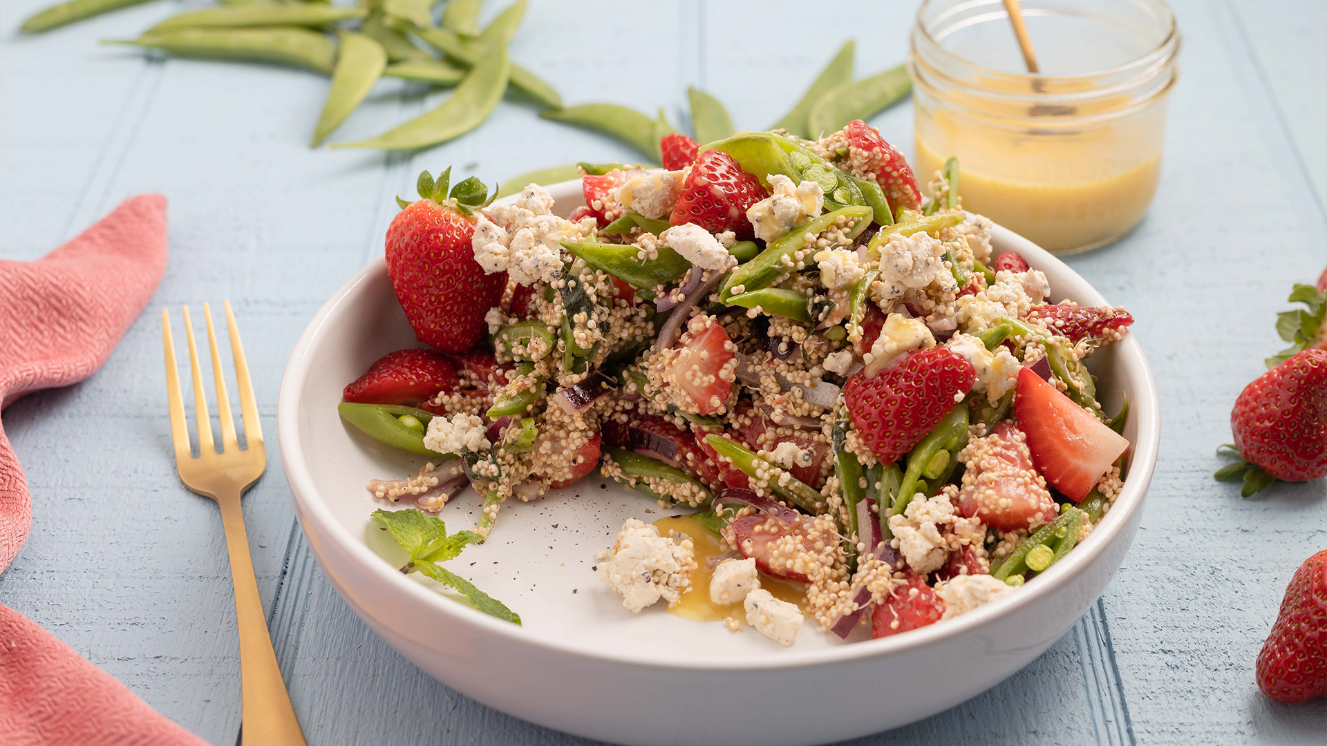 Snap peas and strawberries with sprouted quinoa