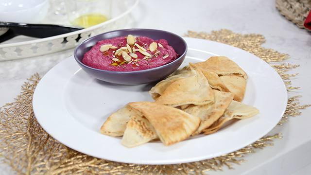 Beet hummus with olive oil and toasted almonds