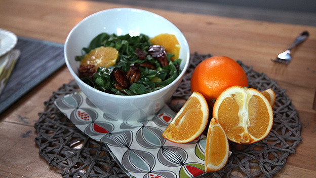 Collard green and blood orange salad with candied pecans and creamy blood orange mustard dressing