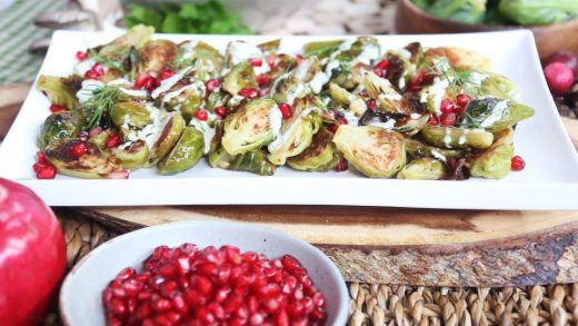 Roasted Brussels sprouts with roasted garlic and herb tahini dressing
