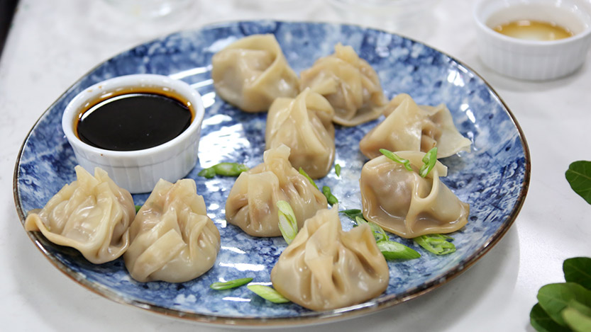 Chinese chicken dumplings with spicy soy