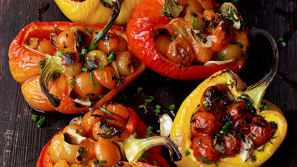 Oven-charred tomato-stuffed peppers