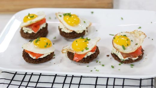 Smoked salmon toasts with fried quail eggs
