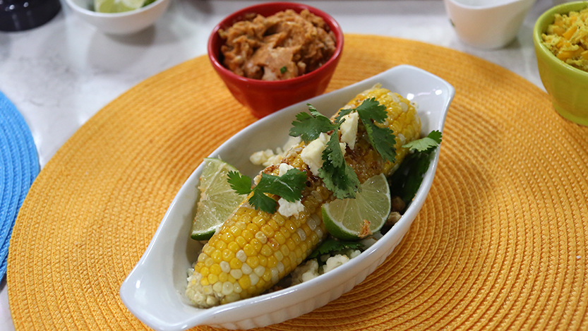 Corn with chipotle butter with cotijo cheese and cilantro
