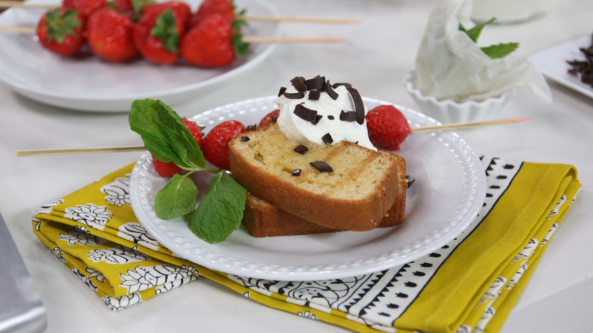 Grilled pound cake with strawberries and cream