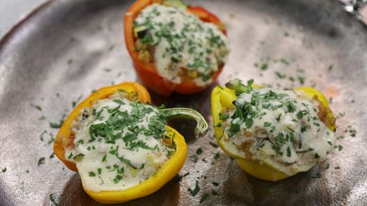 Farro stuffed peppers with goat cheese sauce