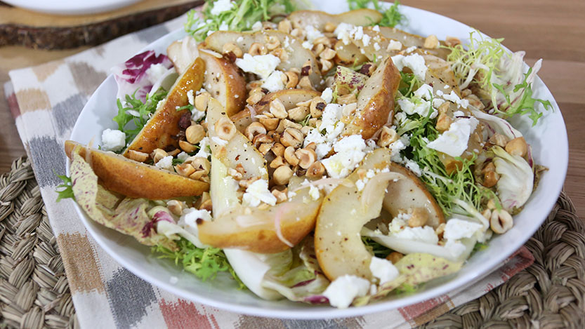 Winter salad with roasted pear, feta and hazelnuts
