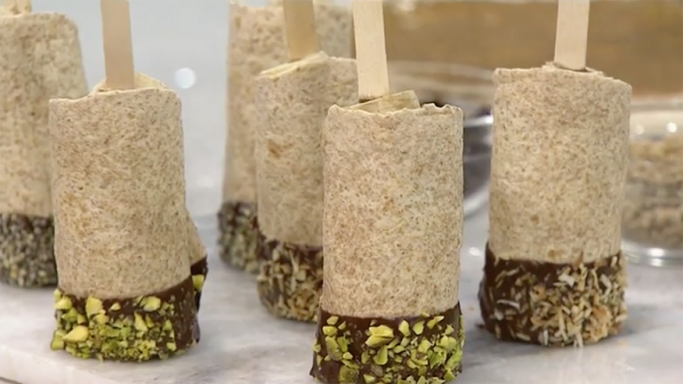 Chocolate-dipped banana crunch roll-up pops