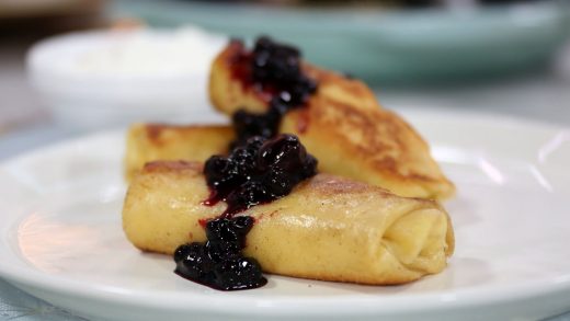 Cheese blintzes with blueberry sauce