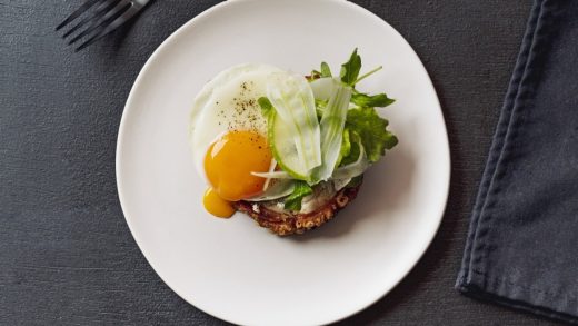 Crispy porchetta and fried egg with shaved fennel and apples