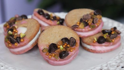 Sandwich cookies with rose water cream cheese icing