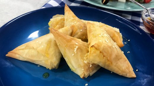 Feta phyllo triangles with honey and sesame seeds