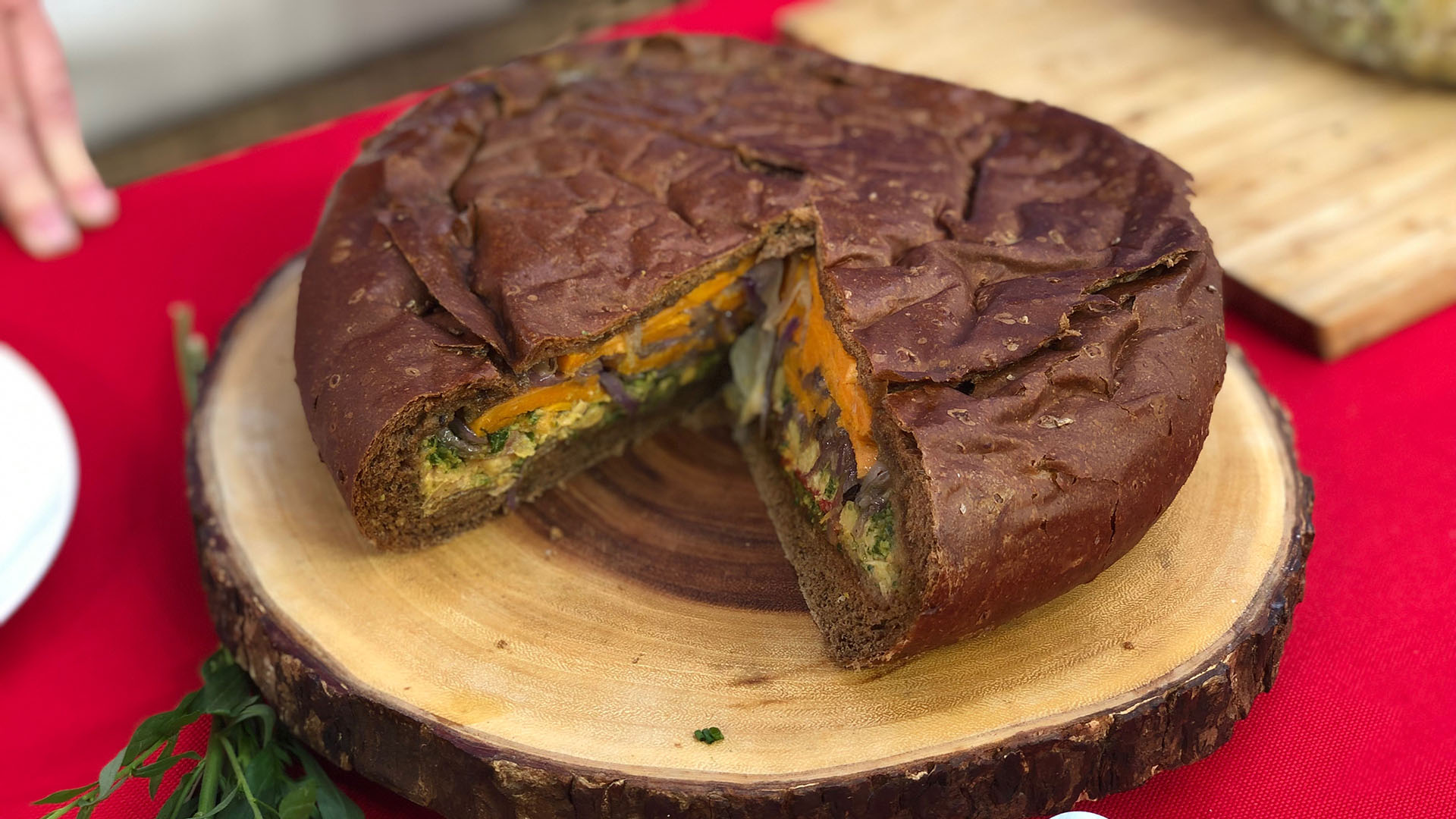 Epic vegetarian picnic sandwich with arugula pesto