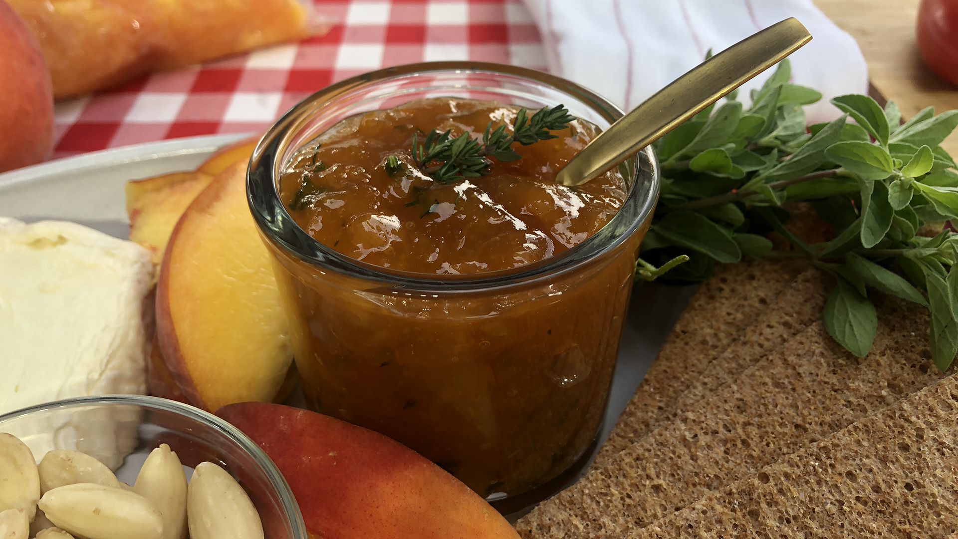 Not-too-sweet peaches and herb jam