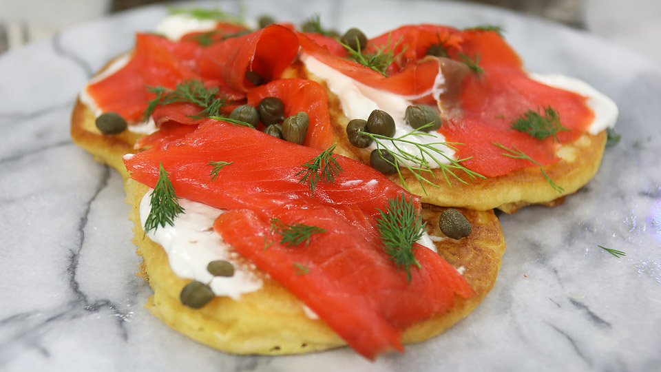Spicy pancakes with smoked salmon and dill