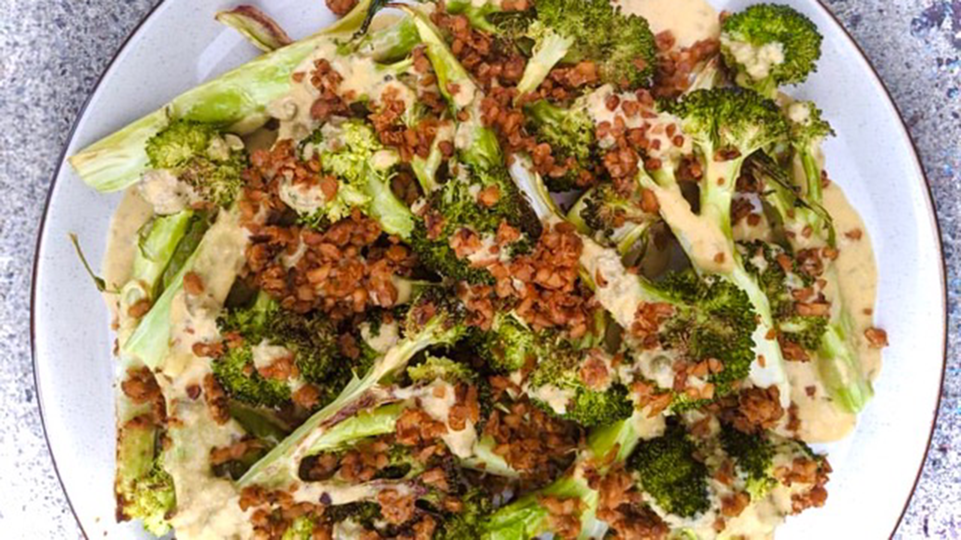 Grilled broccoli Caesar with creamy dressing