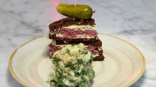 Reuben sandwich with potato salad