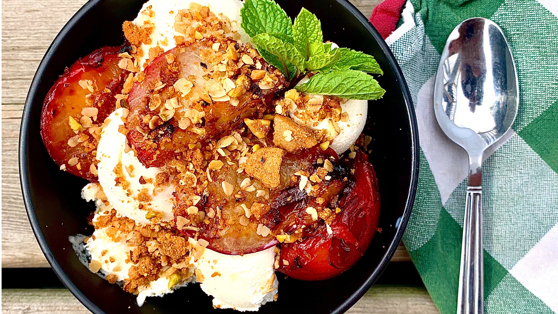 Grilled plum sundaes with a ginger pistachio crumble