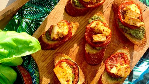 Halloumi and mixed herb pesto crostini with roasted tomatoes