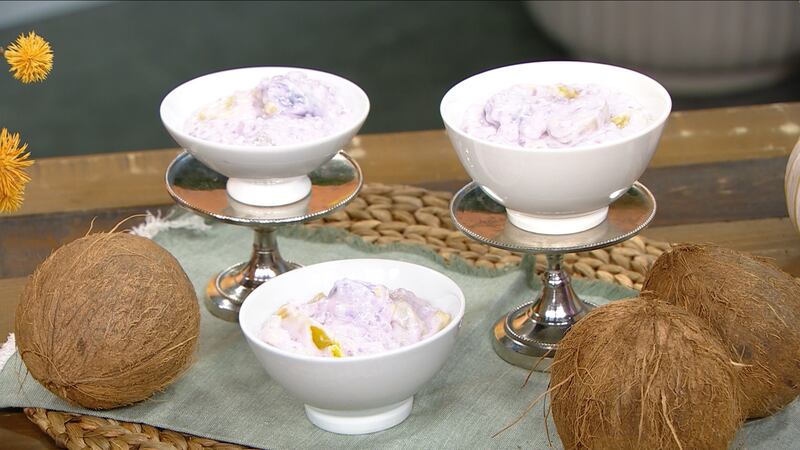 Three small white bowls filled with coconut milk, tapioca pearls, jackfruit, and round white and purple glutinous rice balls